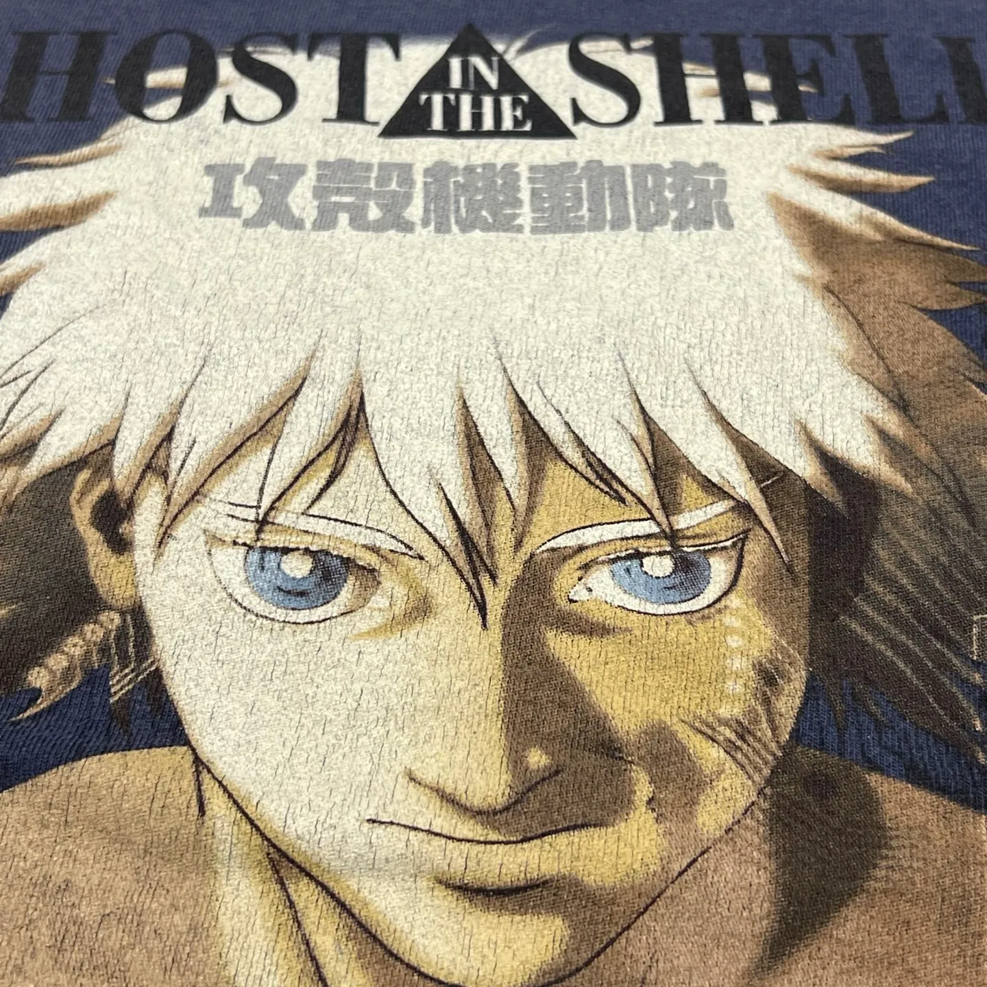 SAINT Mxxxxxx × Ghost in the Shell GS_SS TEE/GST IN THE SHELL/NVY Ghost in the Shell co-branded distressed short-sleeves White-haired plain character TEE Washed blue S-XL Look for the cylindrical fabric with no side seams. The open width is almost meaningless Asut ready-made garments dyed The whole piece is sprayed with horsetail. The collar and cuffs are faded. The collar and cuffs are frayed. Many hangings are worn. The oversized printing position restores the authenticity level. Customized joint main mark/wash mark/with little angel anti-counterfeiting mark